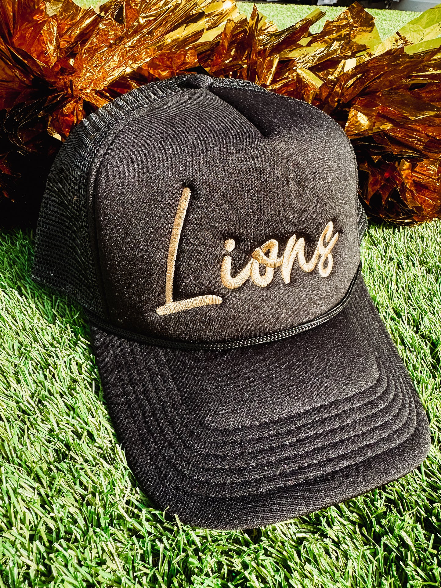 Cursive Lions Trucker Hat